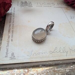 Elegant Silver Pendant with Clear Milky Stone Stamped 925